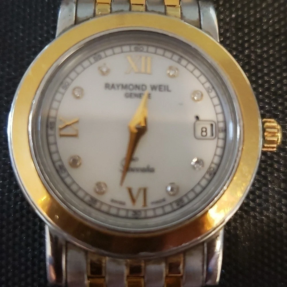 Raymond  Weil Toccata woman's watch with pearl face and Diamond accents.